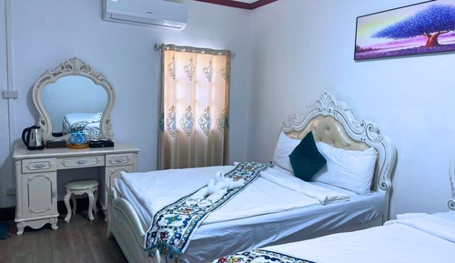 Habitación triple Deluxe