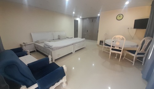 Habitación Business con 1 cama doble o 2 individuales