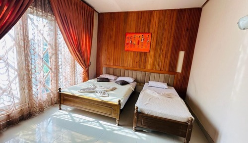 Habitación triple Deluxe