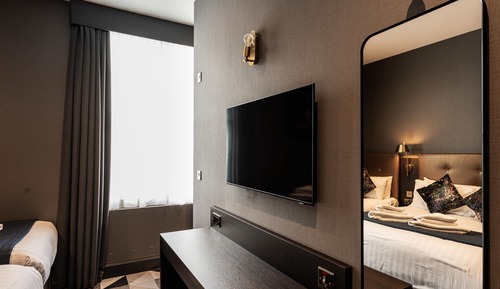 Habitación triple Deluxe