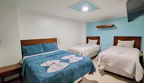 Habitación familiar, varias camas