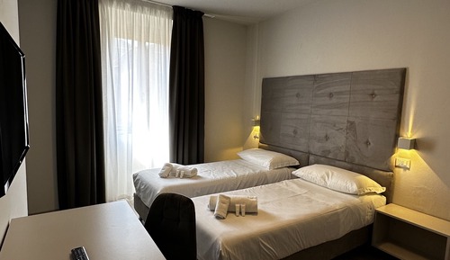 Habitación superior con 1 cama doble o 2 individuales