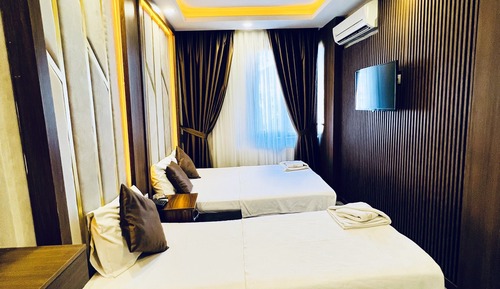 Habitación Deluxe con 1 cama doble o 2 individuales