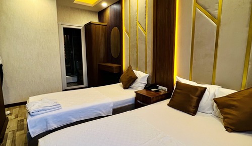 Habitación triple Deluxe