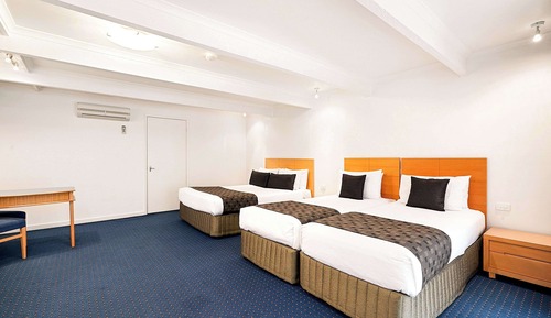 Habitación familiar, varias camas