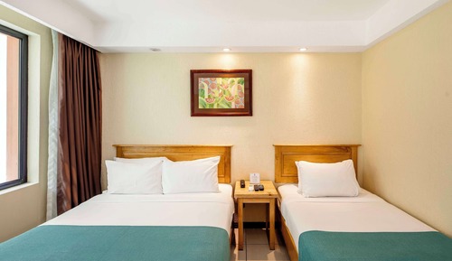 Habitación estándar, varias camas, accesible para personas con discapacidad, vistas al jardín
