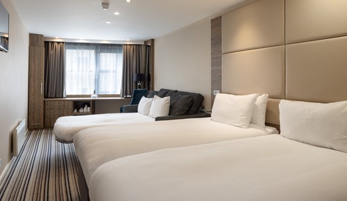 Habitación Premium, varias camas