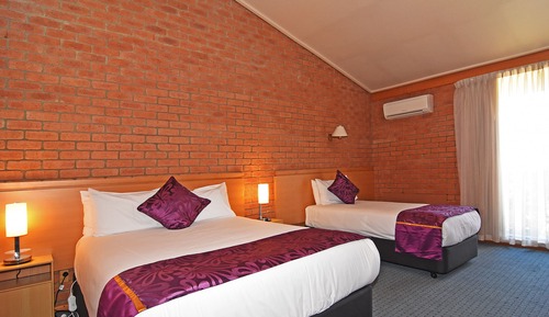 Habitación triple superior, varias camas