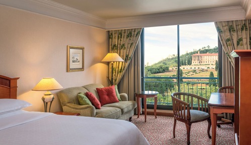 Habitación individual Club, 1 cama de matrimonio grande, vistas a la ciudad, planta ejecutiva