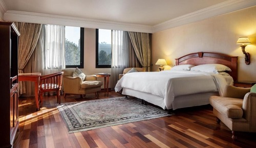 Habitación Deluxe, 1 cama de matrimonio grande, Aire acondicionado, vistas a la ciudad