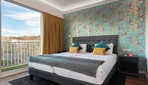 Habitación superior con 1 cama doble o 2 individuales