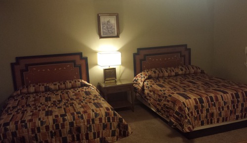 Habitación triple, varias camas