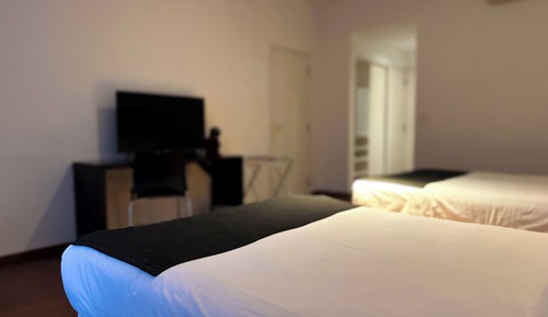 Habitación cuádruple Deluxe, 2 camas de matrimonio