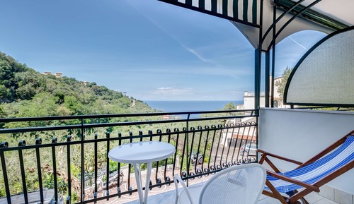 Habitación clásica, varias camas, balcón, vistas al mar