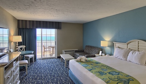 Habitación estándar, 1 cama de matrimonio grande con sofá cama, vistas a la playa