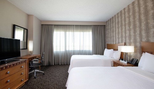 Suite estándar 2 camas dobles y 1 sofá cama No fumadores