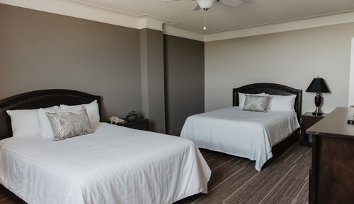 Suite ejecutiva, 2 camas de matrimonio, vistas al lago