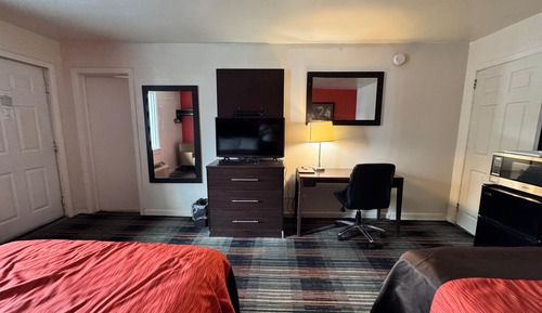 Habitación, varias camas