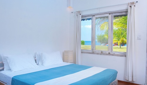 Habitación Deluxe con 1 cama doble o 2 individuales, 1 cama doble, vistas al mar