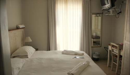 Habitación estándar con 1 cama doble o 2 individuales