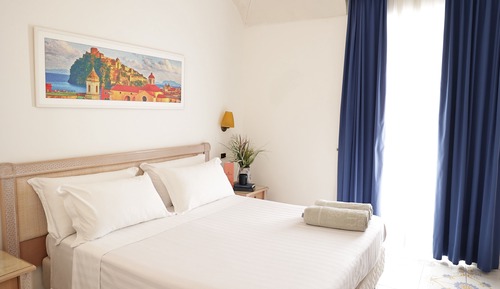 Habitación Confort con 1 cama doble o 2 individuales