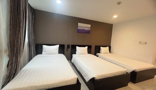 Habitación triple Deluxe