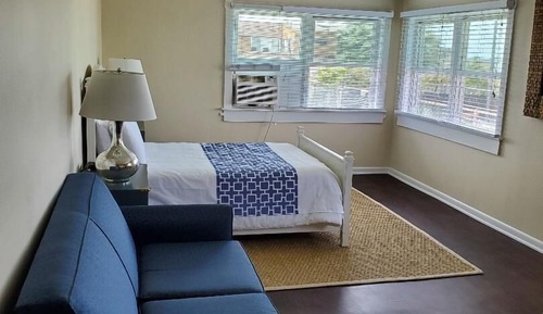 Suite, baño privado, vistas a la bahía