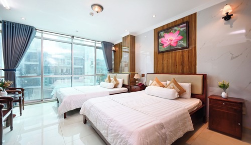 Habitación cuádruple Deluxe, bañera, vistas a la ciudad