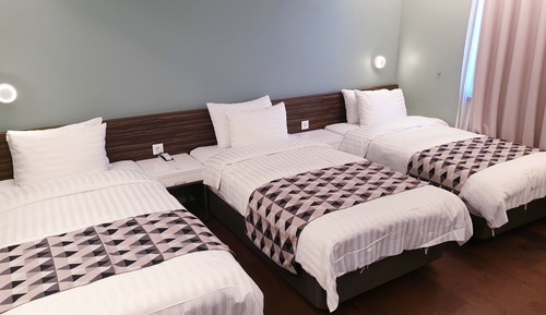 Habitación triple Deluxe