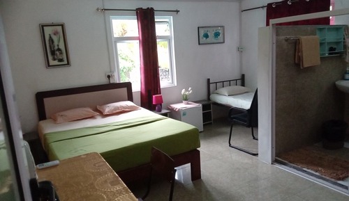 Habitación familiar, vistas al jardín