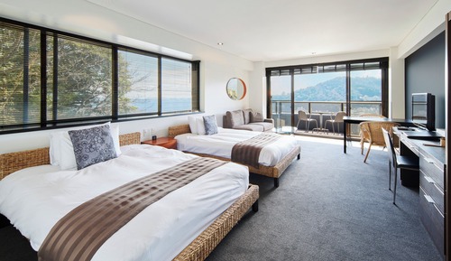 Habitación superior con 2 camas individuales, 2 camas dobles, no fumadores, vistas al mar