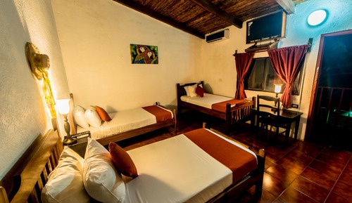 Habitación cuádruple Deluxe