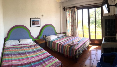 Habitación cuádruple básica, vistas parciales al mar, mirando al mar