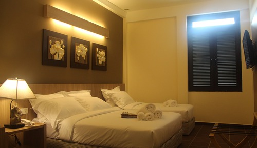 Habitación triple Deluxe