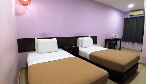 Habitación con 2 camas individuales