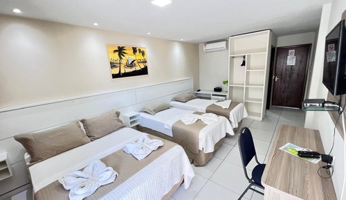 Habitación cuádruple, vistas parciales al mar