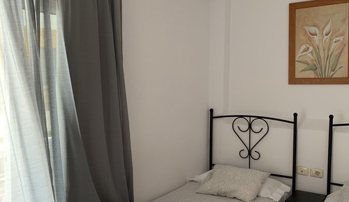 Habitación con 2 camas individuales, baño privado