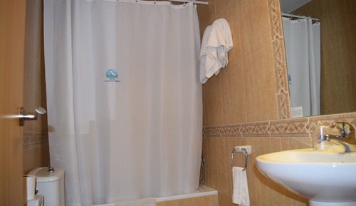 Habitación triple, vistas al mar