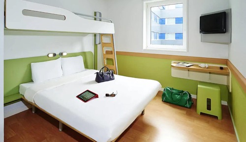 Habitación triple, varias camas
