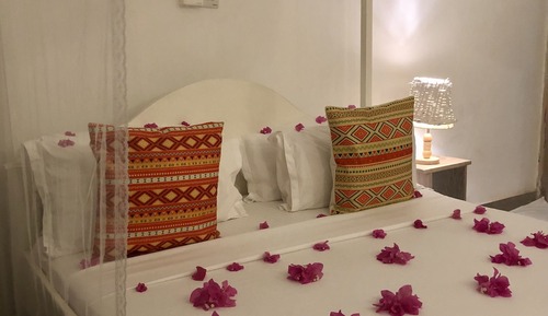 Habitación triple, vistas al jardín