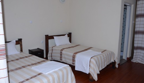 Habitación superior con 2 camas individuales