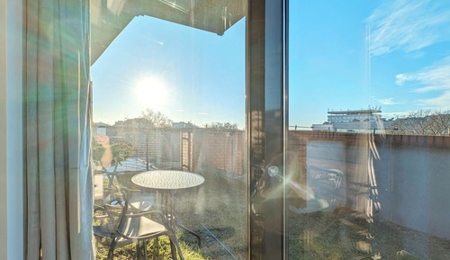 Suite estudio panorámica, balcón, en una planta alta (Air Condition)