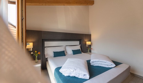 Habitación superior con 1 cama doble o 2 individuales