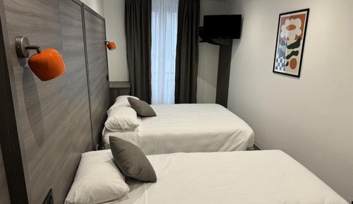 Habitación familiar con 2 camas individuales