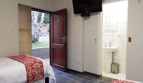 Habitación básica con 2 camas individuales, 2 camas individuales, vistas al jardín