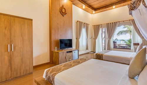 Habitación familiar con 1 cama doble o 2 individuales, frente a la playa