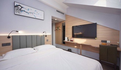 Habitación doble superior (高级大床房)