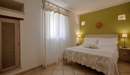 Habitación Deluxe, 1 cama de matrimonio grande, vistas al jardín, en la zona del patio