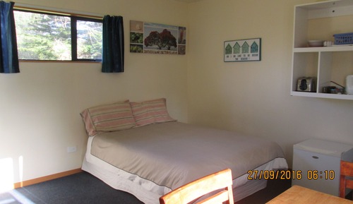 Cabaña básica, baño compartido