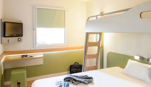 Habitación triple, varias camas
